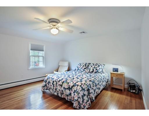 3 Flintlock Circle Hingham, MA 02043 - Photo 15 of 23 a bedroom with a bed window and a window