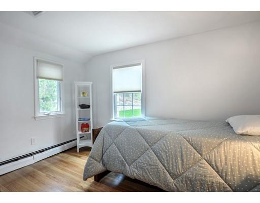 3 Flintlock Circle Hingham, MA 02043 - Photo 17 of 23 a bedroom with a bed and a window