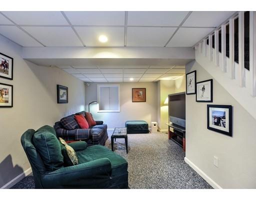 3 Flintlock Circle Hingham, MA 02043 - Photo 18 of 23 a living room with furniture and a flat screen tv
