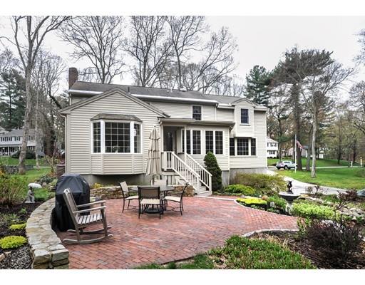 3 Flintlock Circle Hingham, MA 02043 - Photo 20 of 23 a view of a house with a yard chairs and couches in a patio