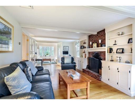 3 Flintlock Circle Hingham, MA 02043 - Photo 3 of 23 a living room with furniture and a fireplace
