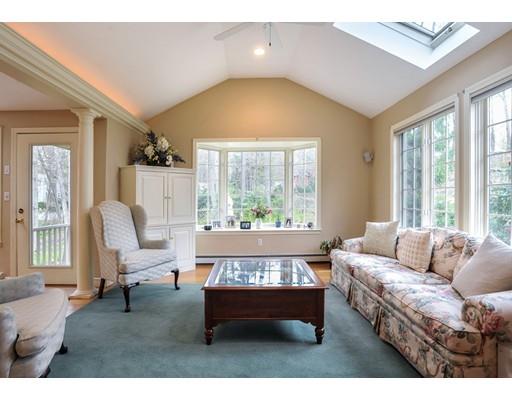 3 Flintlock Circle Hingham, MA 02043 - Photo 4 of 23 a living room with furniture and a large window