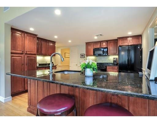 3 Flintlock Circle Hingham, MA 02043 - Photo 8 of 23 a kitchen with refrigerator and stove