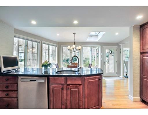 3 Flintlock Circle Hingham, MA 02043 - Photo 9 of 23 a kitchen with granite countertop a stove and a wooden floors
