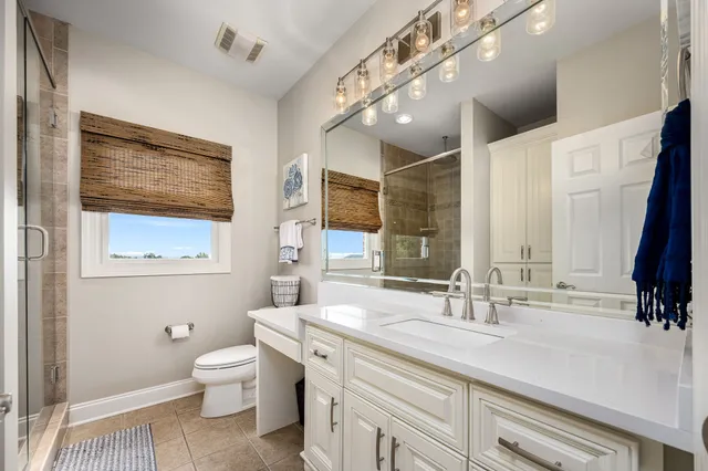 a view of a house with swimming pool and a yard