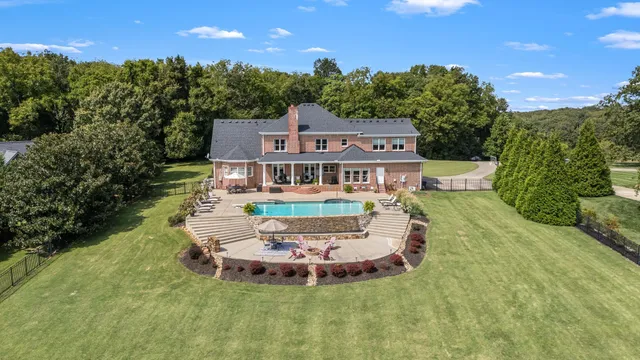 front view of a house with a potted plant