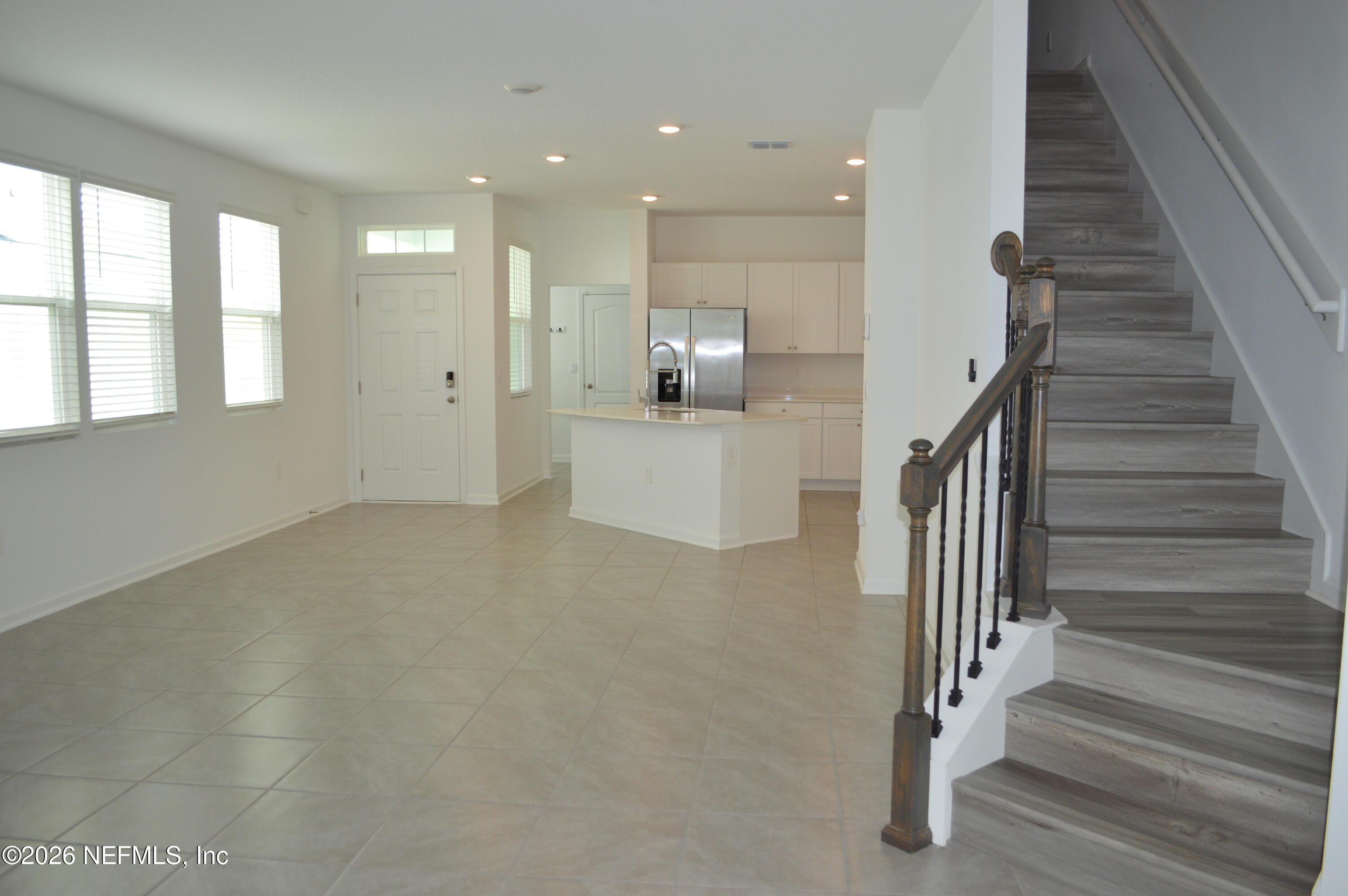 155 Seaport Breeze Road St. Augustine, FL 32095 - Photo 15 of 29 a view of entryway and hall with wooden floor