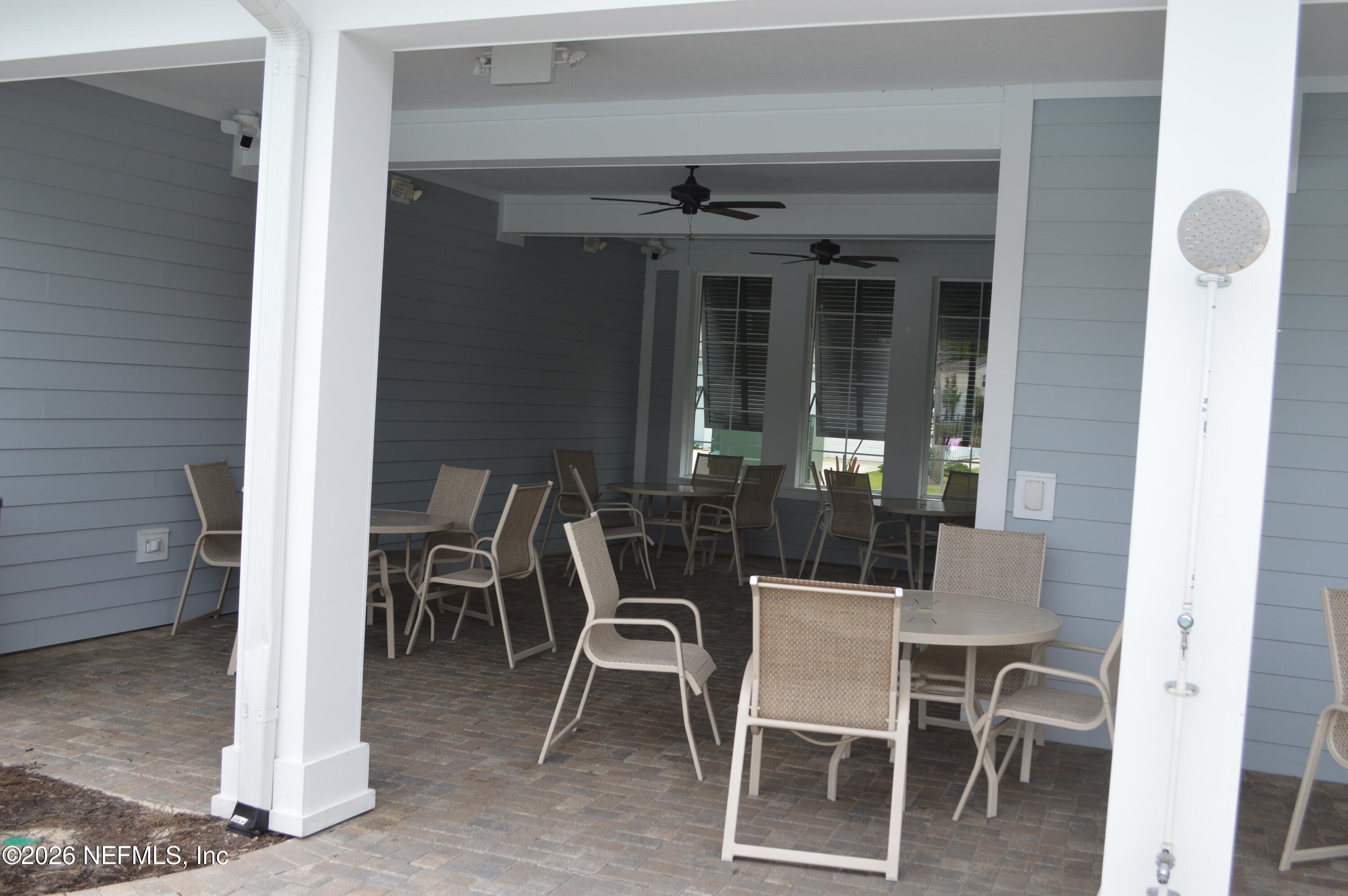 155 Seaport Breeze Road St. Augustine, FL 32095 - Photo 21 of 29 a dining room with furniture and window