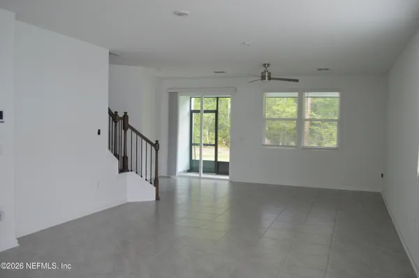an empty room with windows