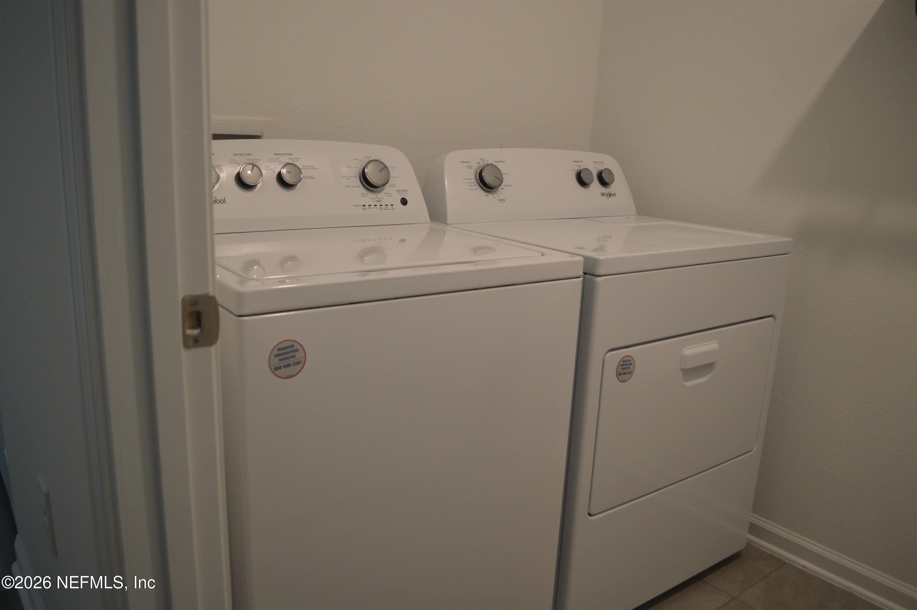 155 Seaport Breeze Road St. Augustine, FL 32095 - Photo 7 of 29 a utility room with dryer and washer