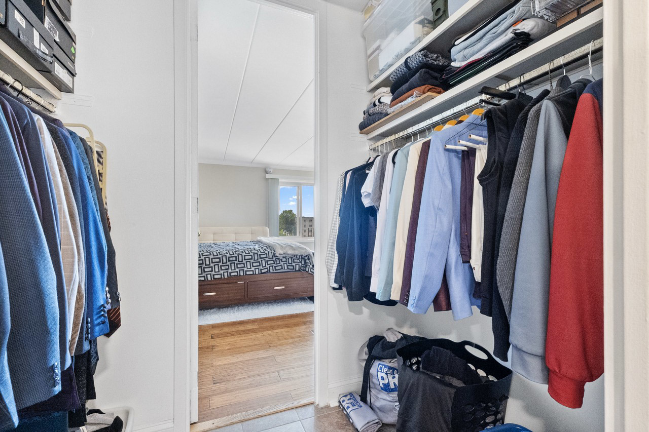 16 East Old Willow Road, Unit 424S Prospect Heights, IL 60070 - Photo 8 of 24 a view of walk in closet with clothes and shoes