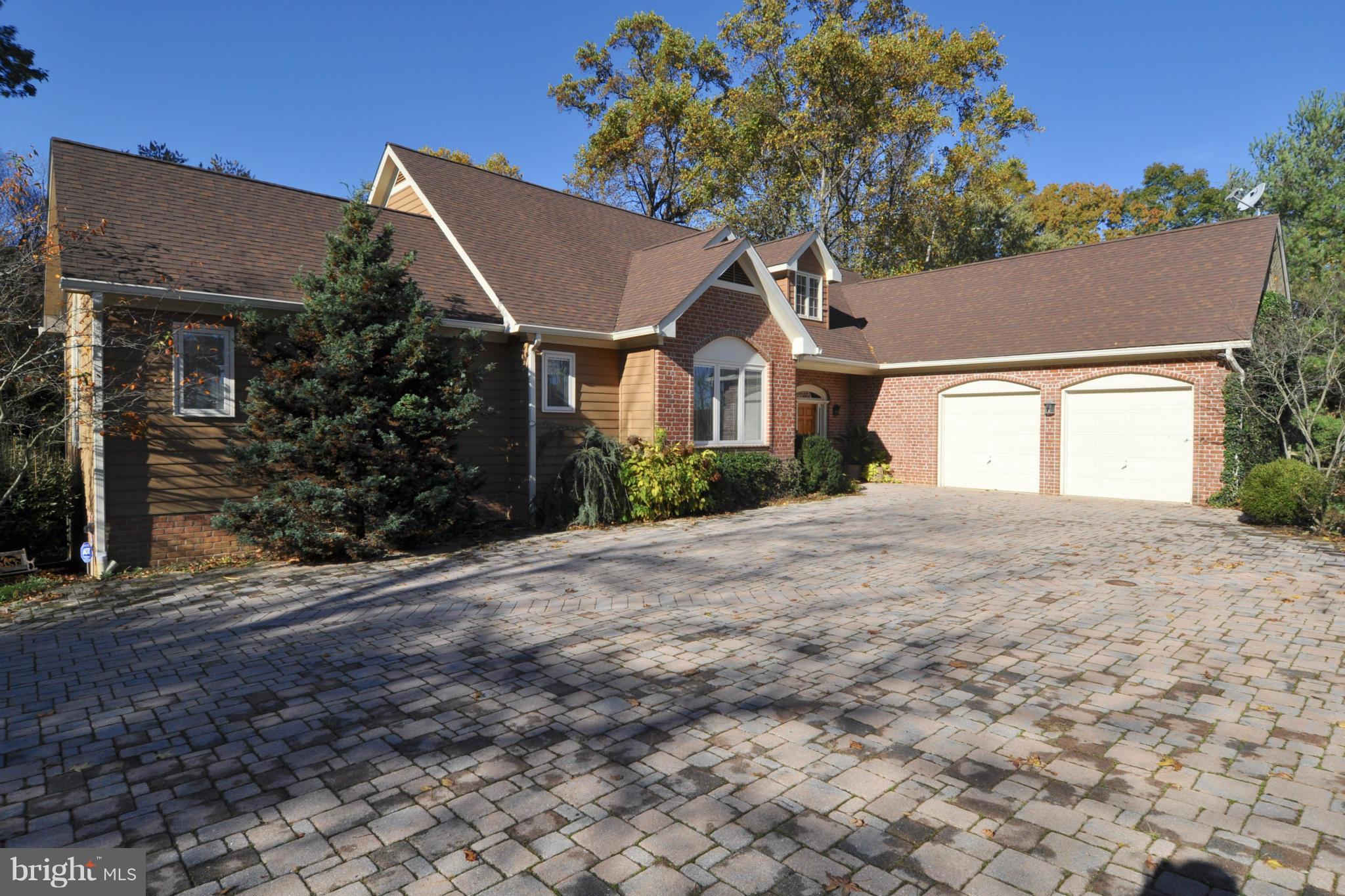 1890 Hidden Point Road Annapolis, MD 21409 - Photo 1 of 30 front view of a house with a yard