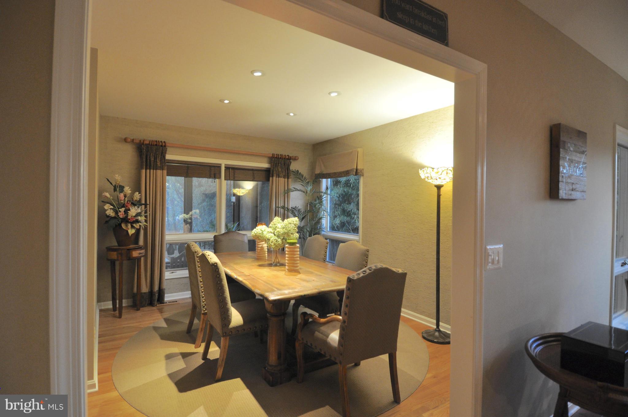 1890 Hidden Point Road Annapolis, MD 21409 - Photo 13 of 30 a view of a dining room with furniture