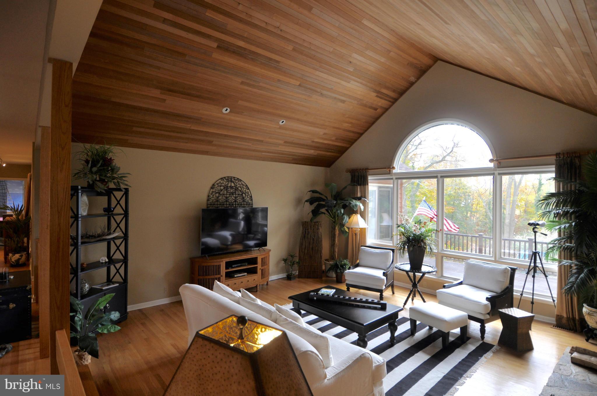 1890 Hidden Point Road Annapolis, MD 21409 - Photo 5 of 30 a room with furniture and a large window