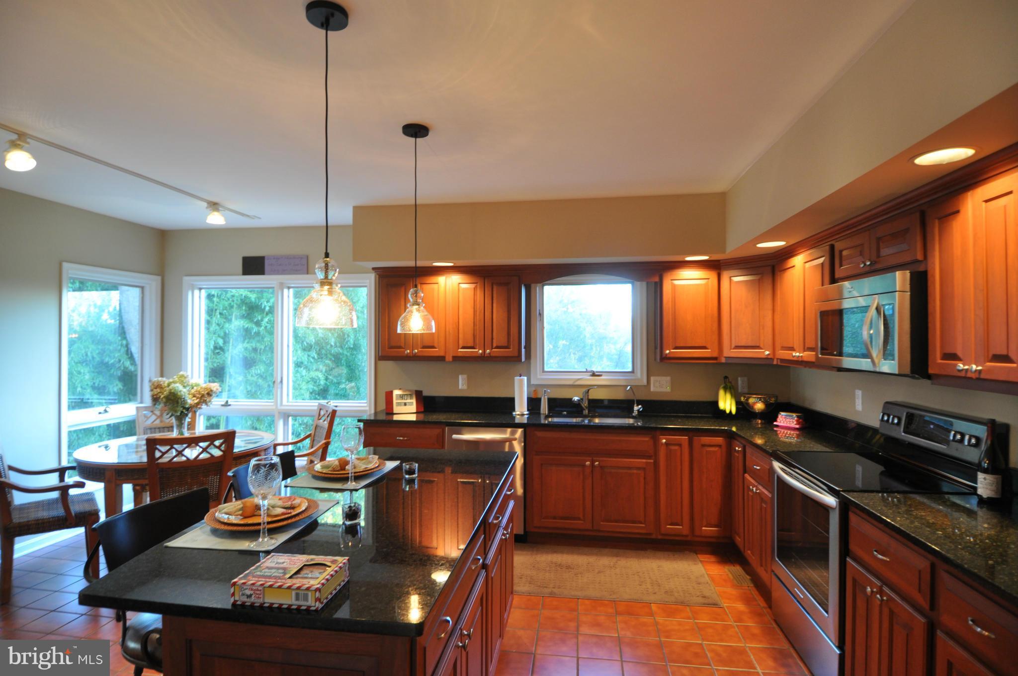 1890 Hidden Point Road Annapolis, MD 21409 - Photo 10 of 30 a kitchen with lots of counter top space