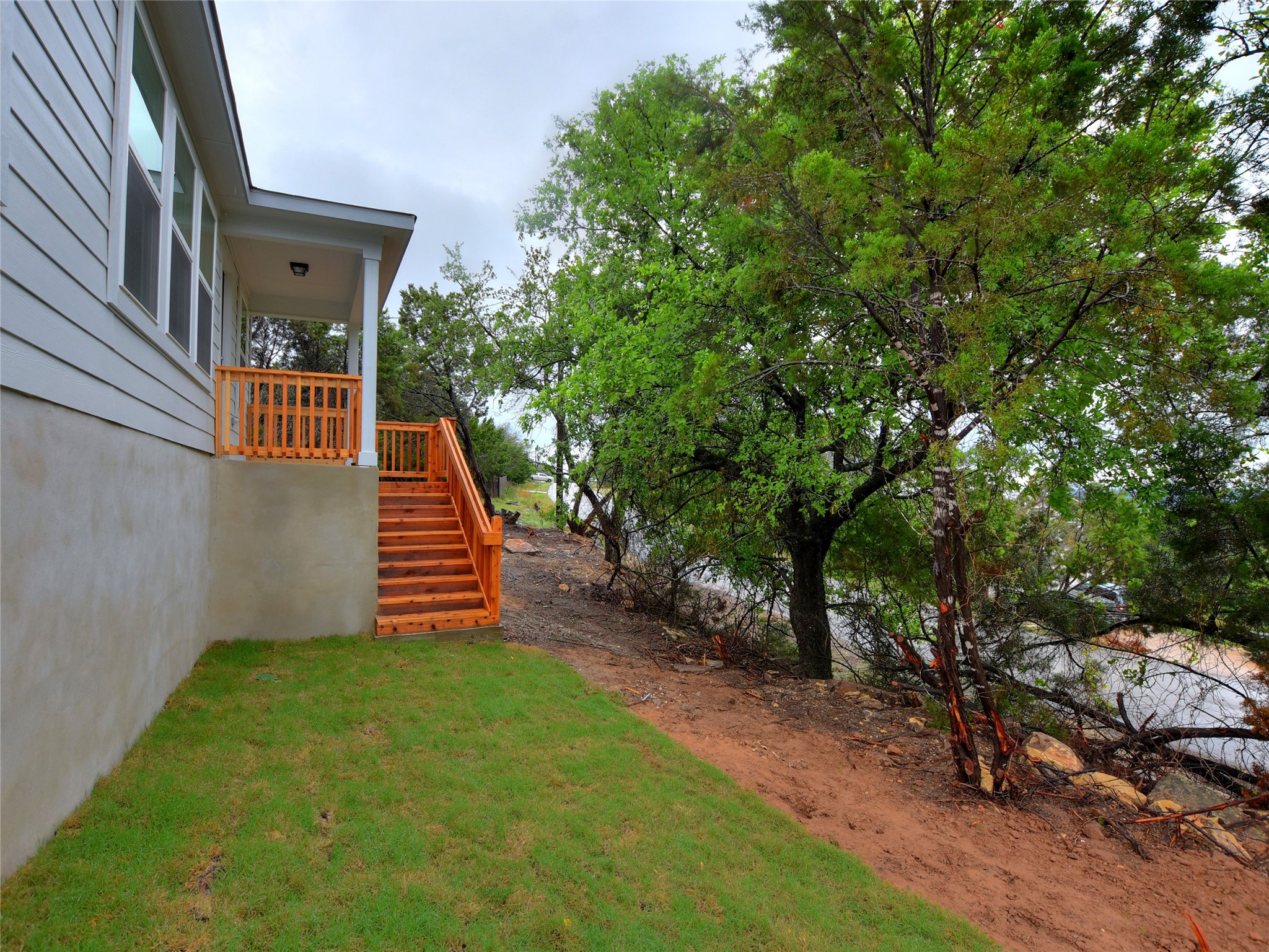 20701 Boggy Ford Road Lago Vista, TX 78645 - Photo 28 of 40 View of green lawn featuring stairs