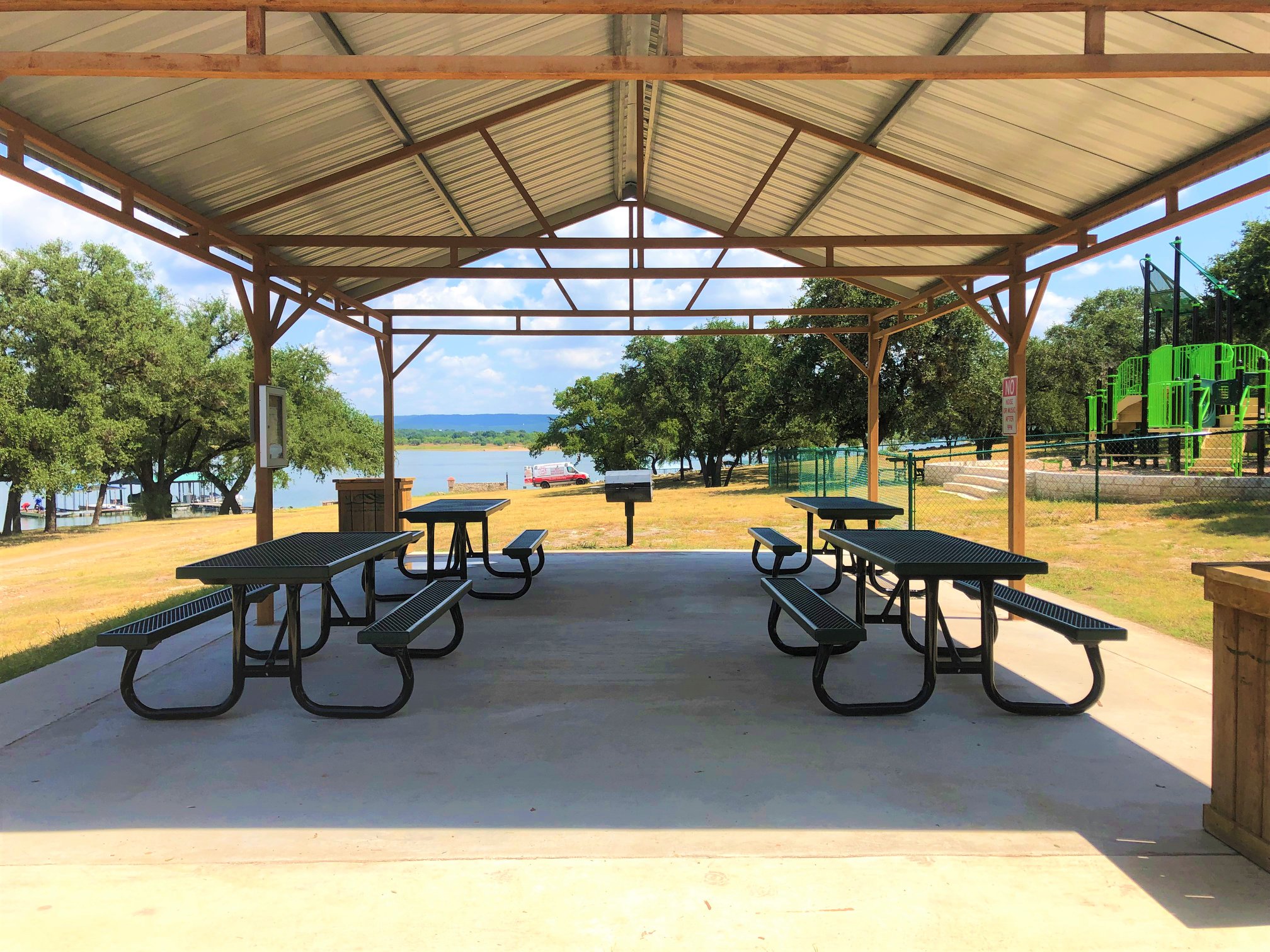 20701 Boggy Ford Road Lago Vista, TX 78645 - Photo 34 of 40 Surrounding community with a patio and a water view