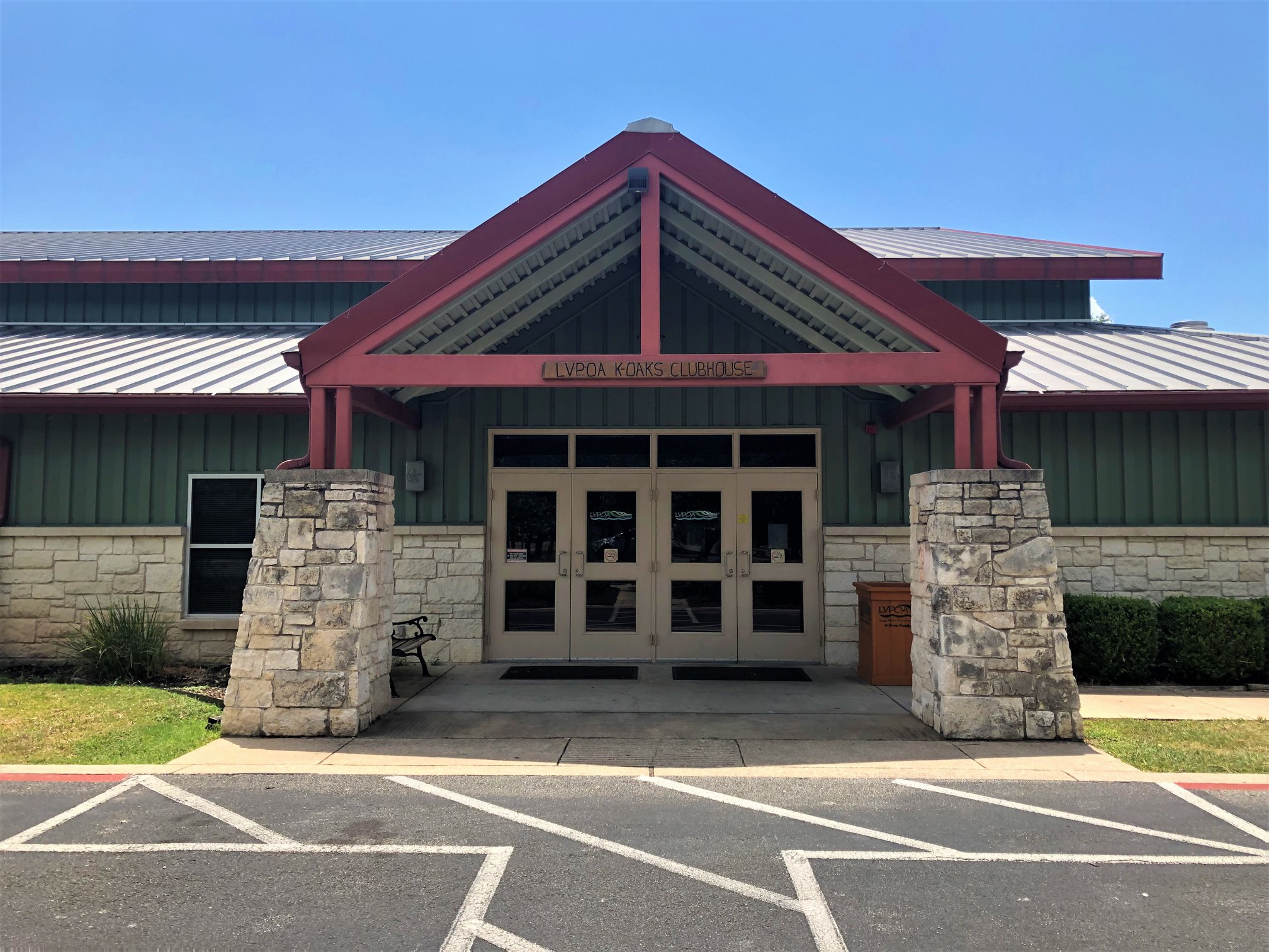 20701 Boggy Ford Road Lago Vista, TX 78645 - Photo 36 of 40 Doorway to property featuring stone siding, board and batten siding, french doors, and a standing seam roof
