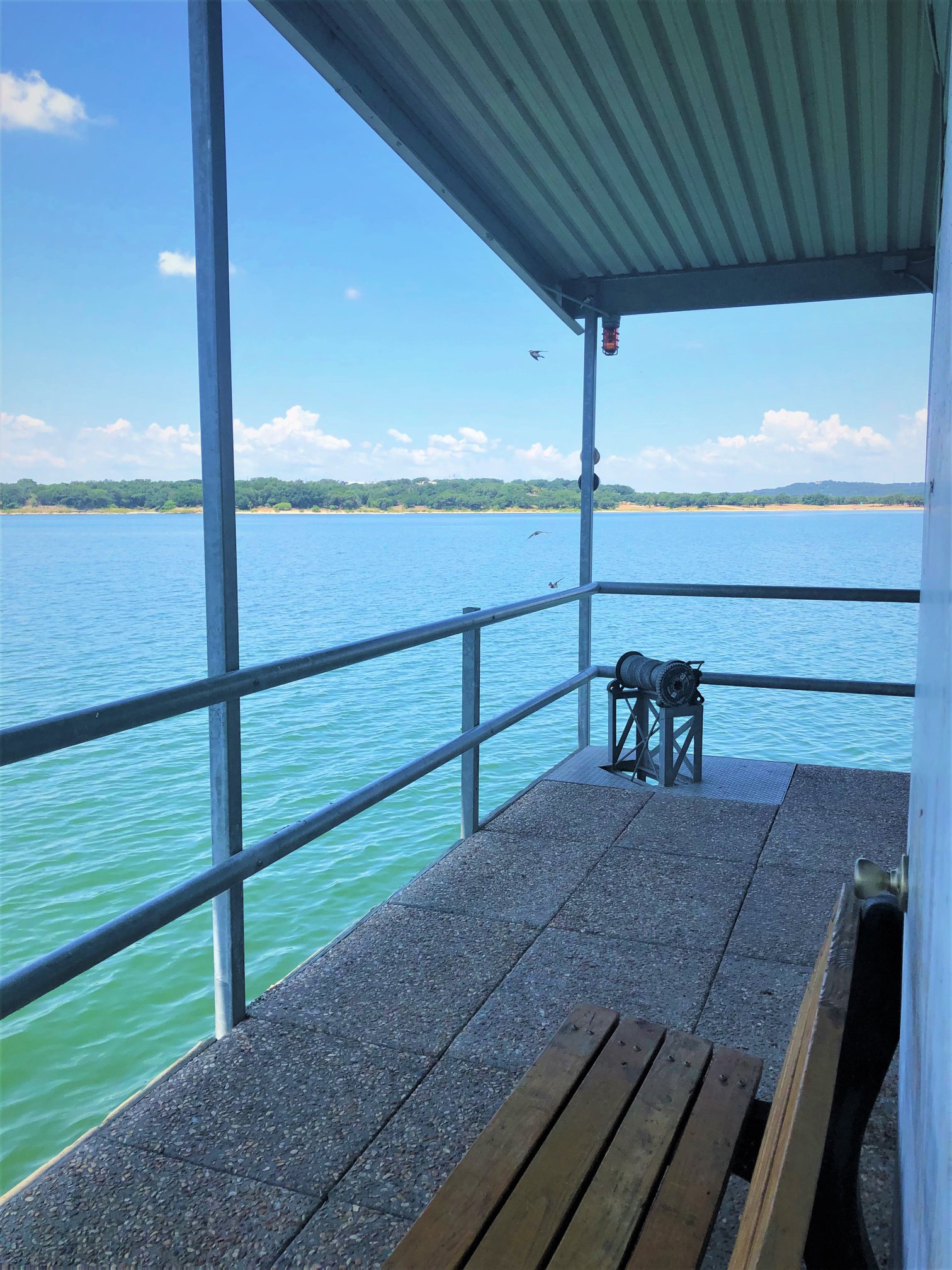 20701 Boggy Ford Road Lago Vista, TX 78645 - Photo 39 of 40 Dock with a balcony and a water view