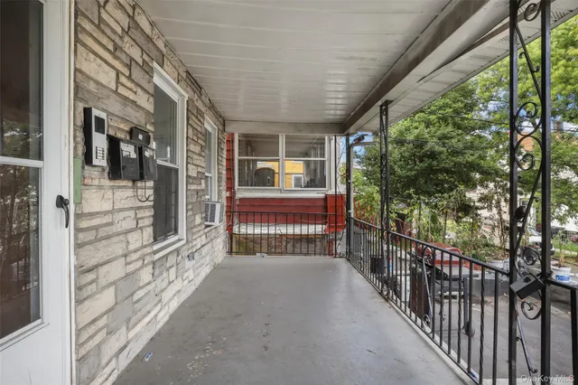 a view of a house with a tree