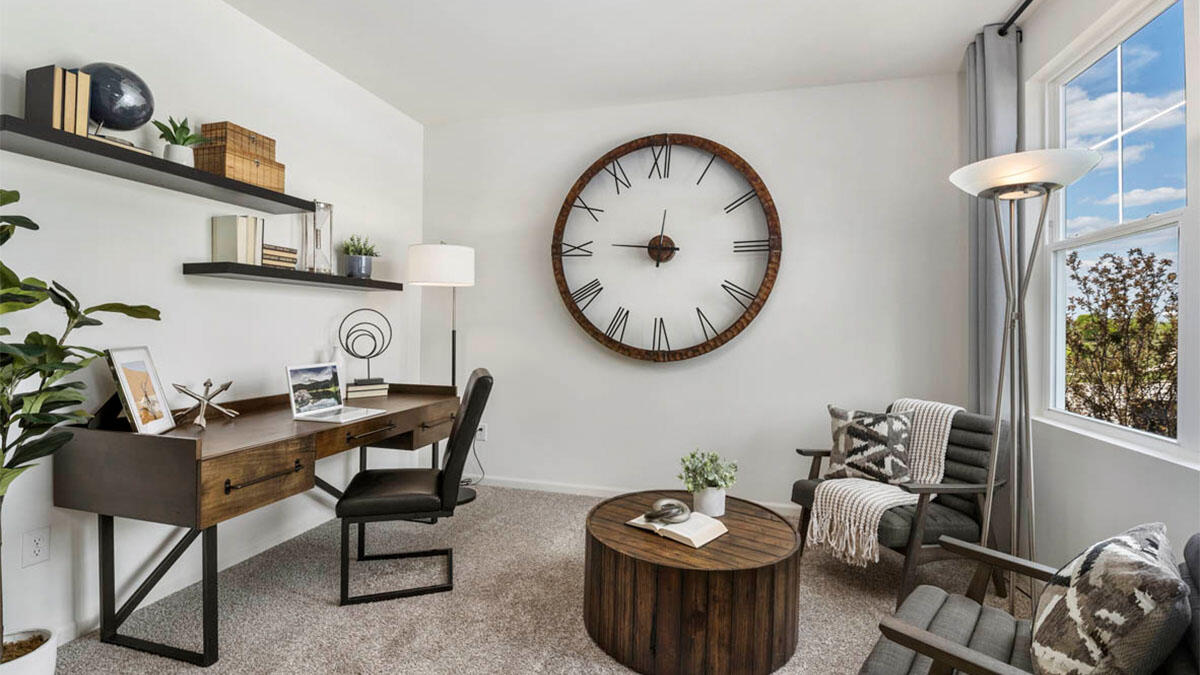 10365 Blaine Street Crown Point, IN 46307 - Photo 35 of 51 a view of a livingroom with furniture and a kitchen
