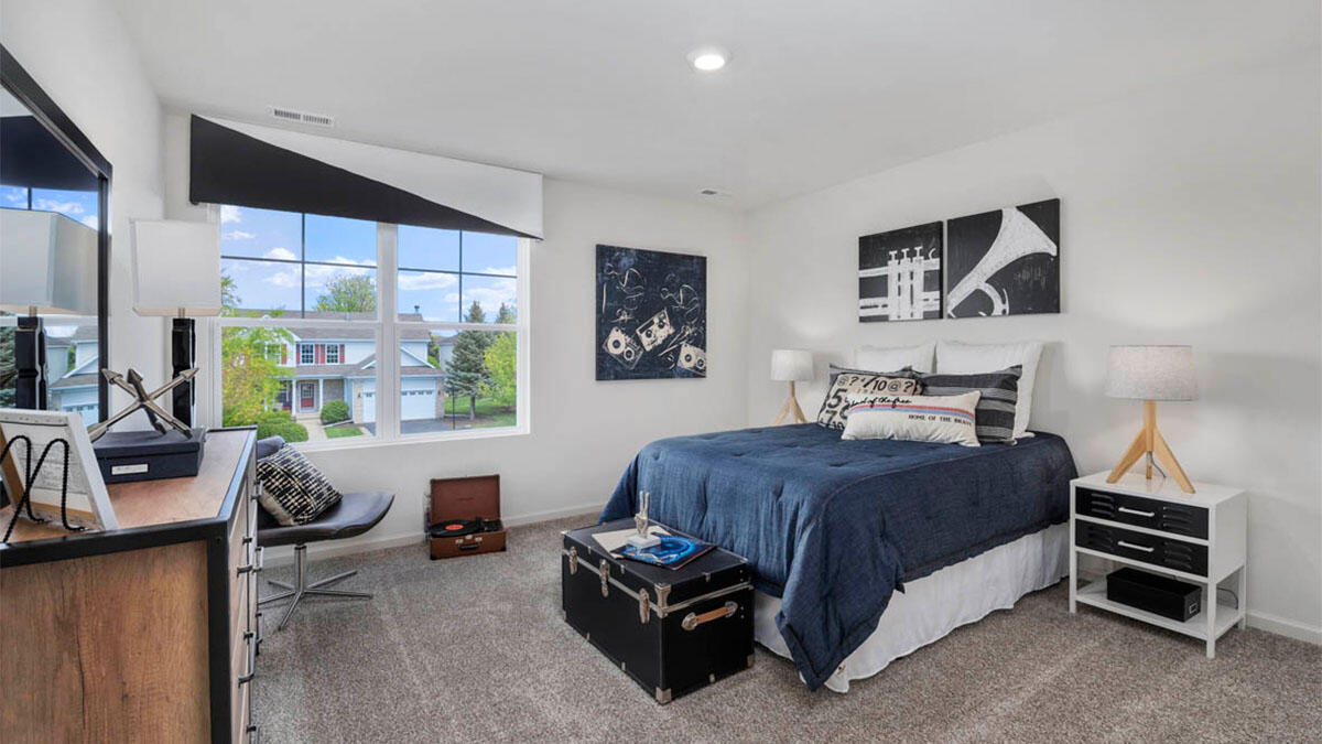 10365 Blaine Street Crown Point, IN 46307 - Photo 43 of 51 a bedroom with a bed and furniture