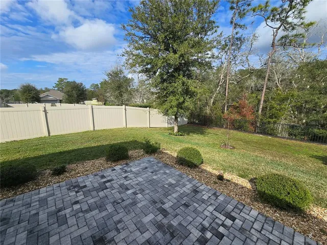 a view of a golf course with a yard