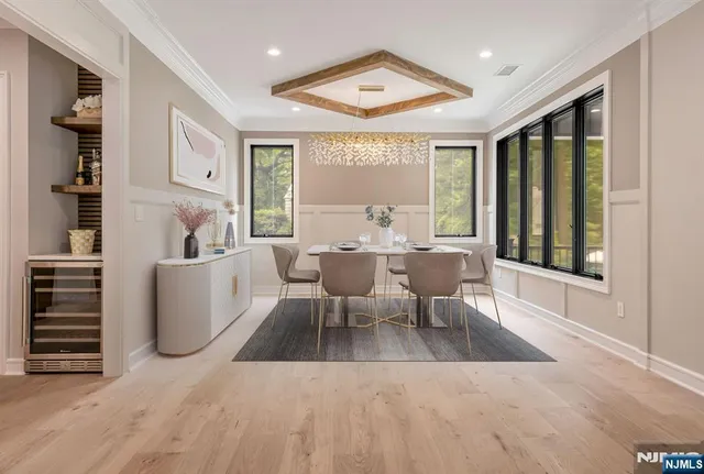 a living room with furniture and large window