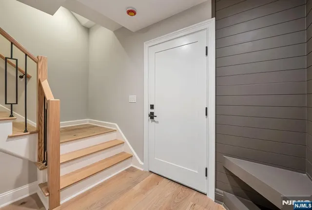 a view of front door and bedroom