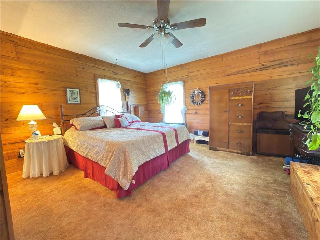 122 Coal Bank Road Greenville, PA 16125 - Photo 45 of 50 a spacious bedroom with a bed dresser and a window