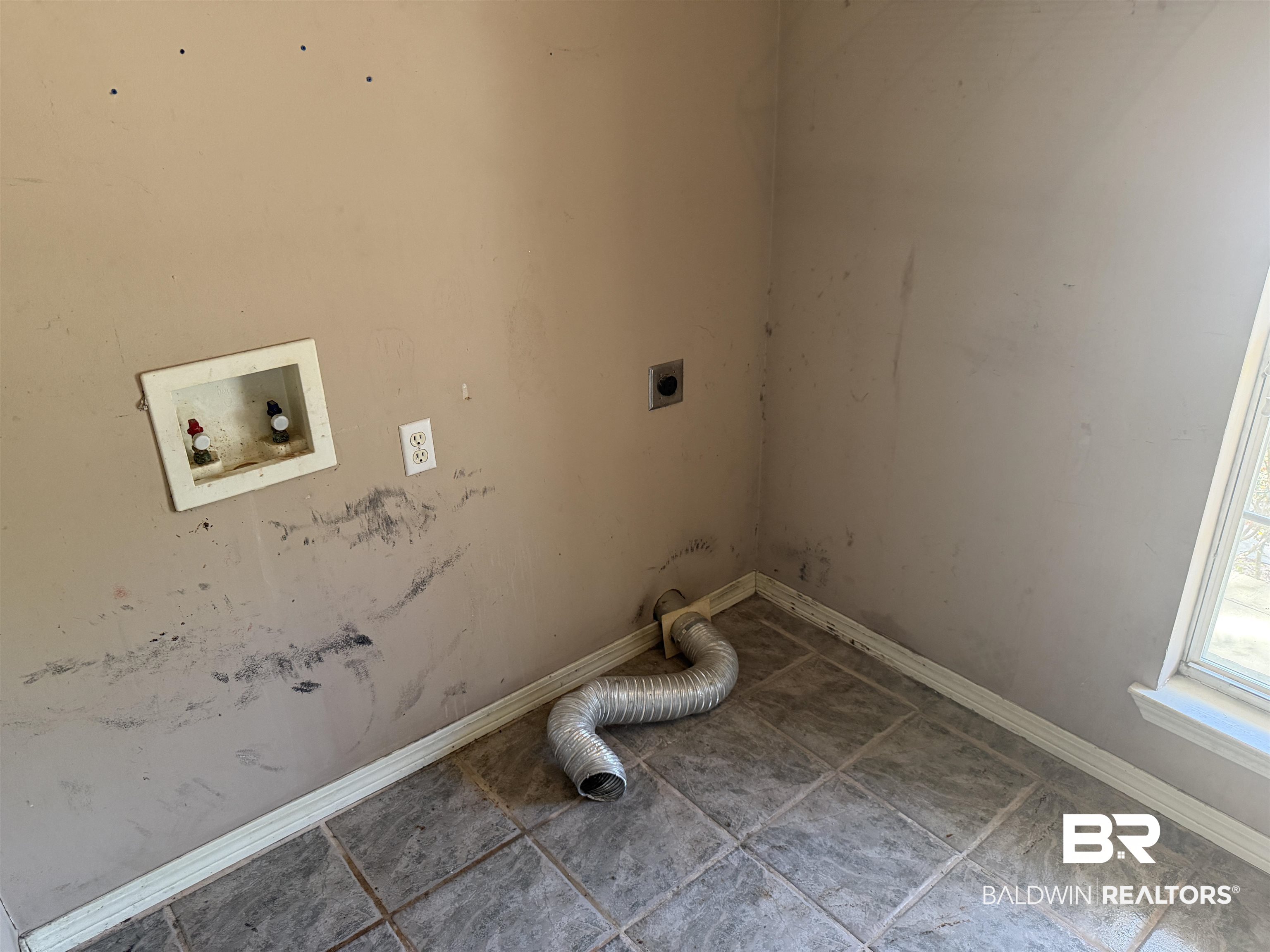 7067 Pinehill Road Daphne, AL 36526 - Photo 8 of 18 Laundry area with hookup for a washing machine, electric dryer hookup, and tile patterned floors