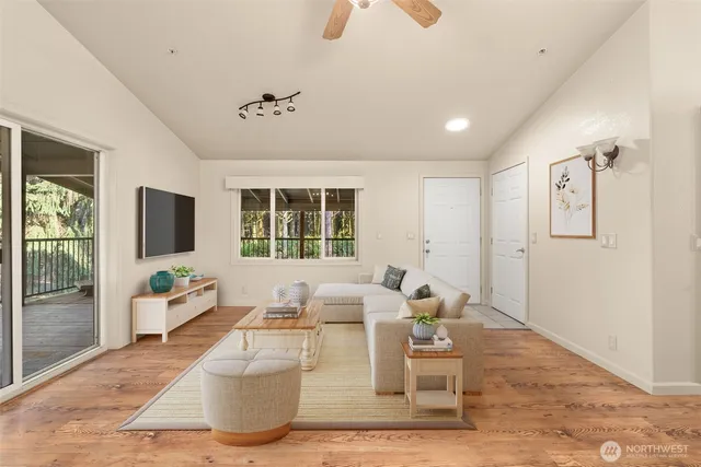 a view of an empty room with a window