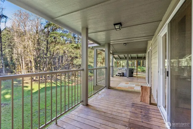 a front view of a house with a yard table and chairs