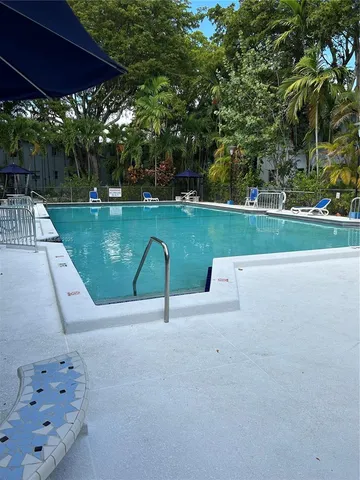 a view of backyard with green space