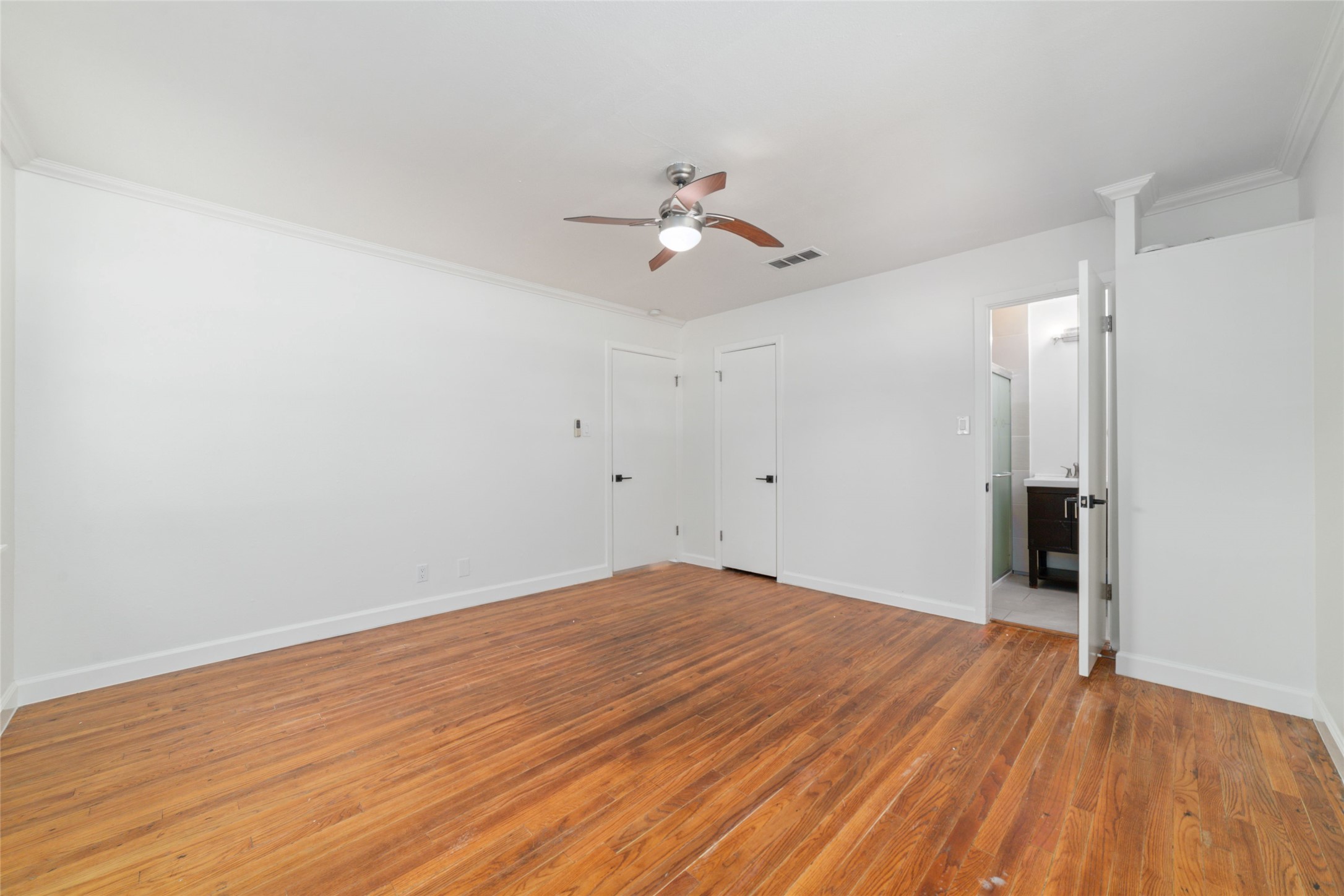 4415 Merwin Street Houston, TX 77027 - Photo 15 of 18 wooden floor in an empty room