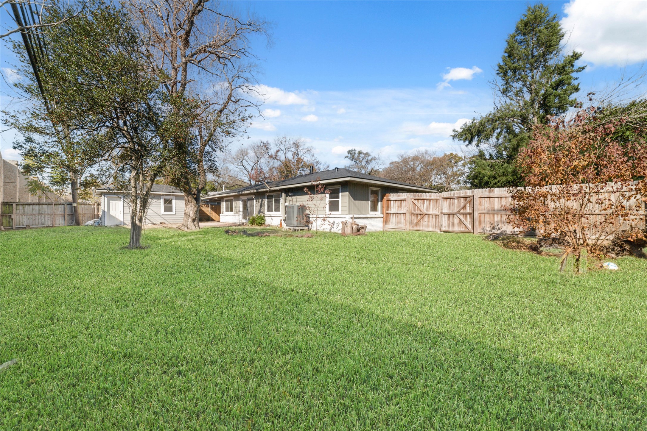4415 Merwin Street Houston, TX 77027 - Photo 18 of 18 a view of house with backyard