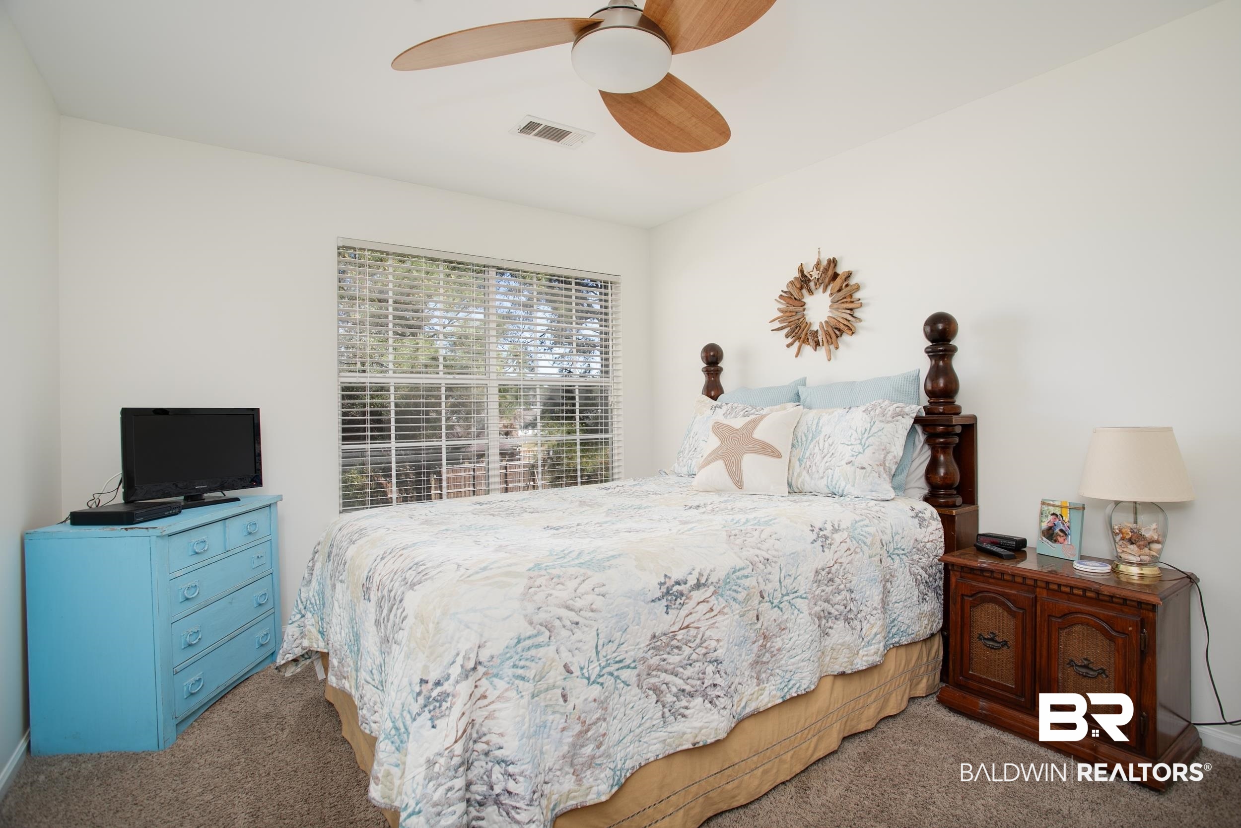 1517 Regency Road, Unit 33 Gulf Shores, AL 36542 - Photo 18 of 29 Carpeted bedroom featuring visible vents and ceiling fan