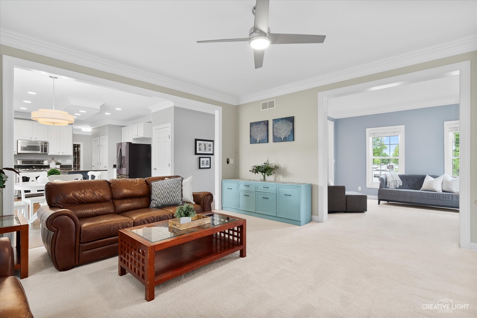 4N414 School Road St. Charles, IL 60175 - Photo 11 of 41 a living room with furniture and a view of kitchen