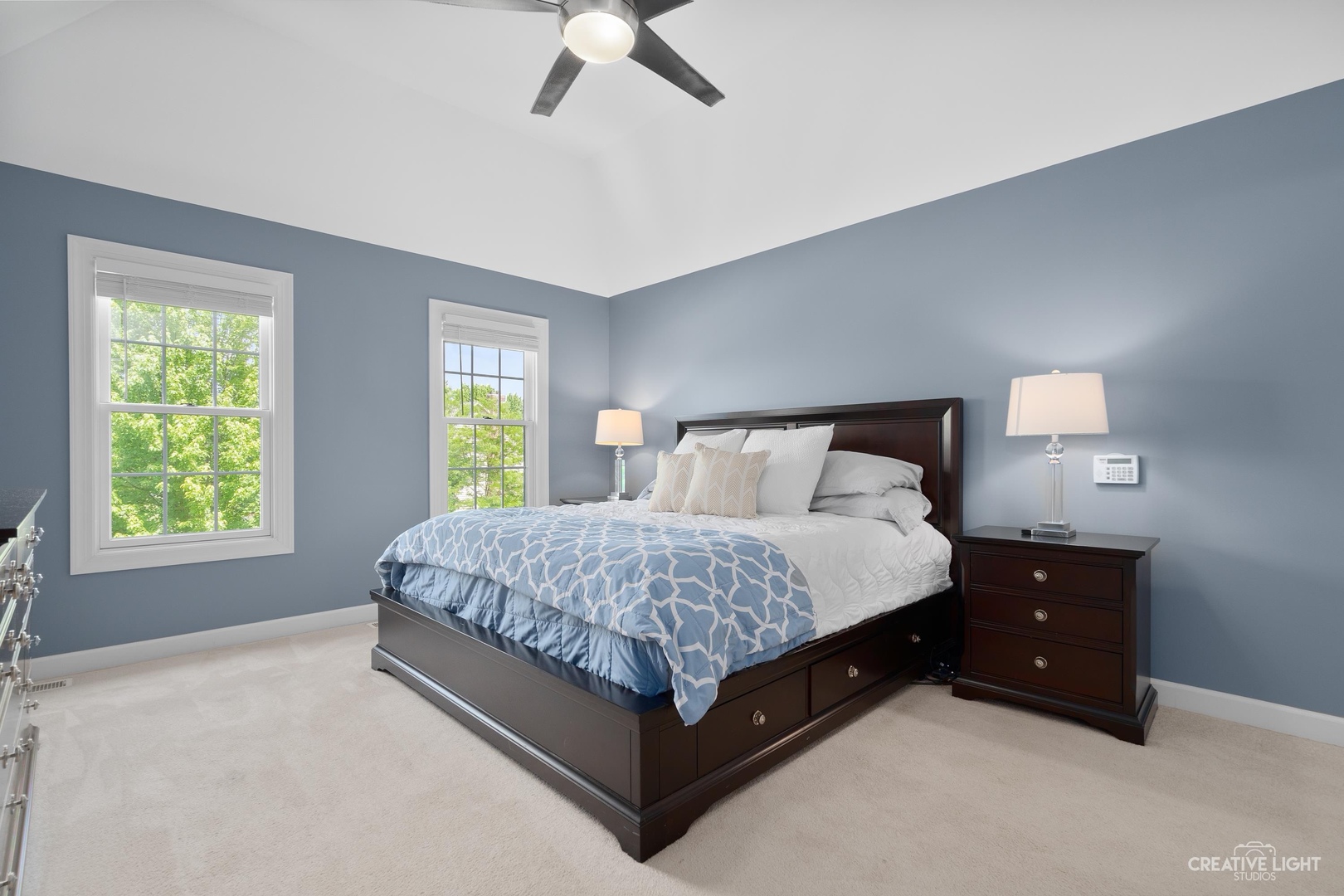 4N414 School Road St. Charles, IL 60175 - Photo 21 of 41 a large bed sitting in a bedroom next to a window