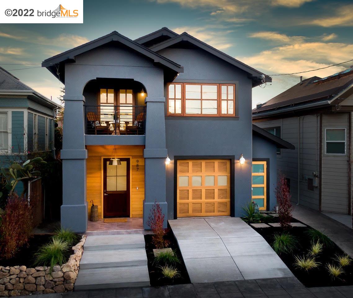 987 57th Street Oakland, CA 94608 - Photo 1 of 1 a front view of a house with a yard