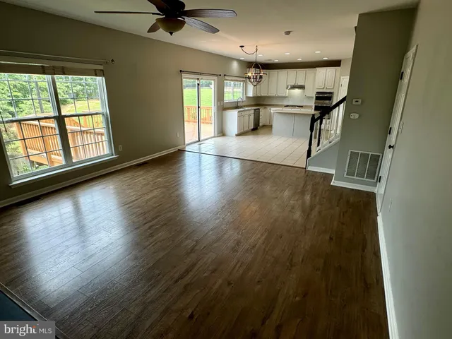an entryway in a hall with a window