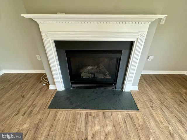 a living room with a fireplace