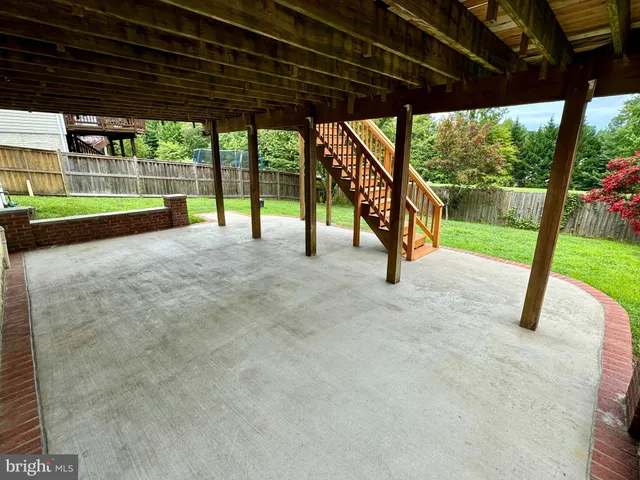 a view of porch with green space