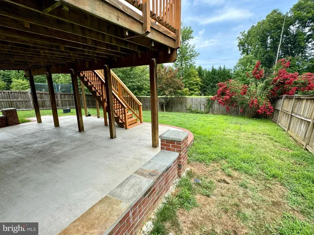 a view of a garage with parked cars