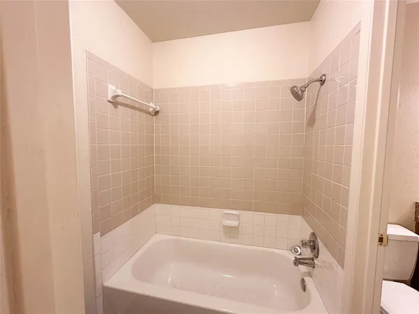 a bathroom with a bathtub
