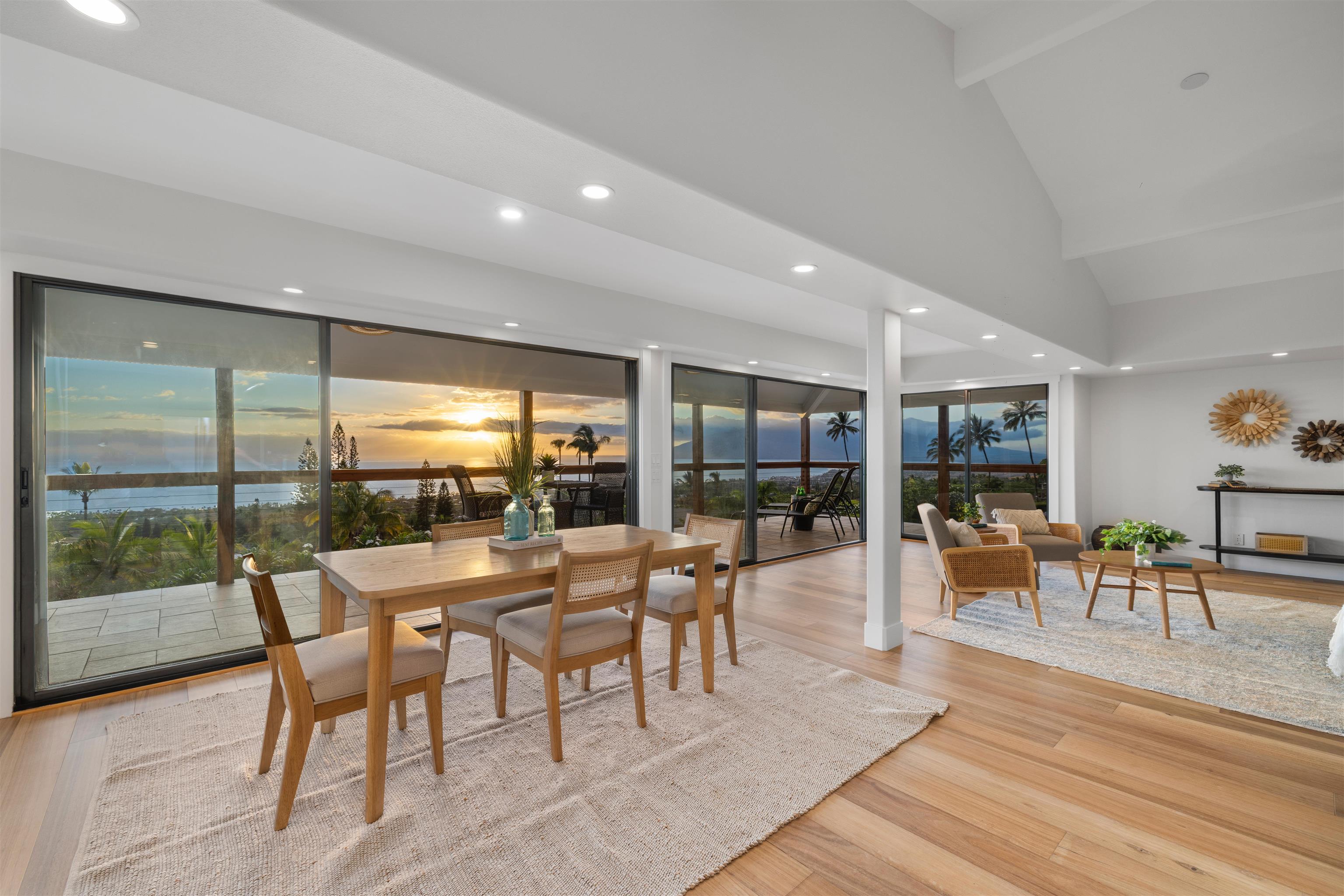a dining room with furniture wooden floor and a rug