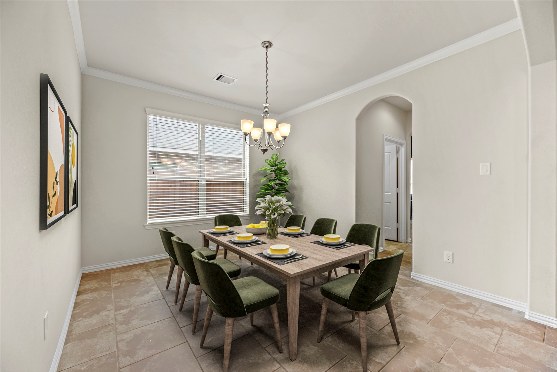 5205 Rainy Garden Court Rosharon, TX 77583 - Photo 19 of 43 a dining room with furniture a potted plant and a chandelier