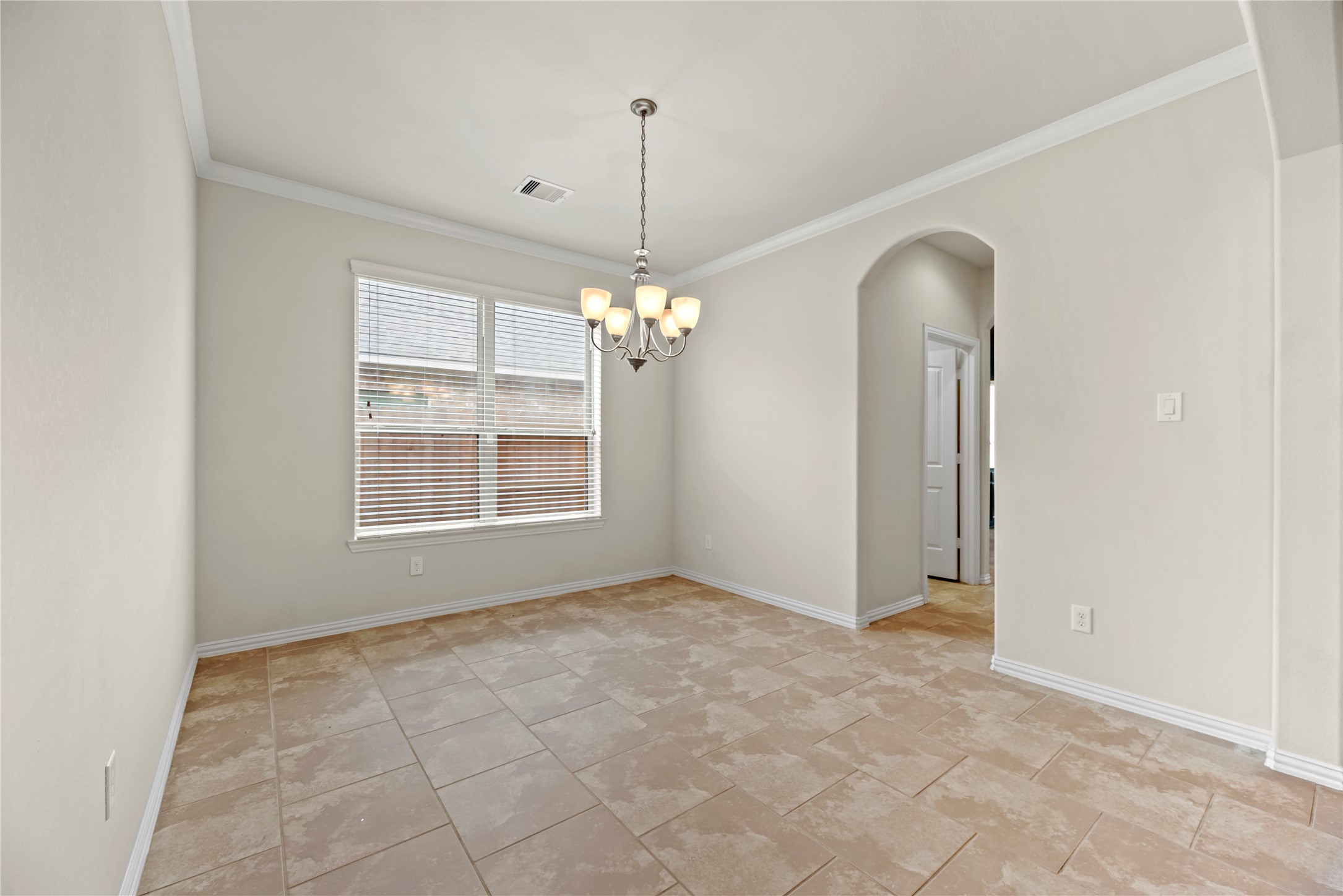 5205 Rainy Garden Court Rosharon, TX 77583 - Photo 20 of 43 a view of an empty room with a window