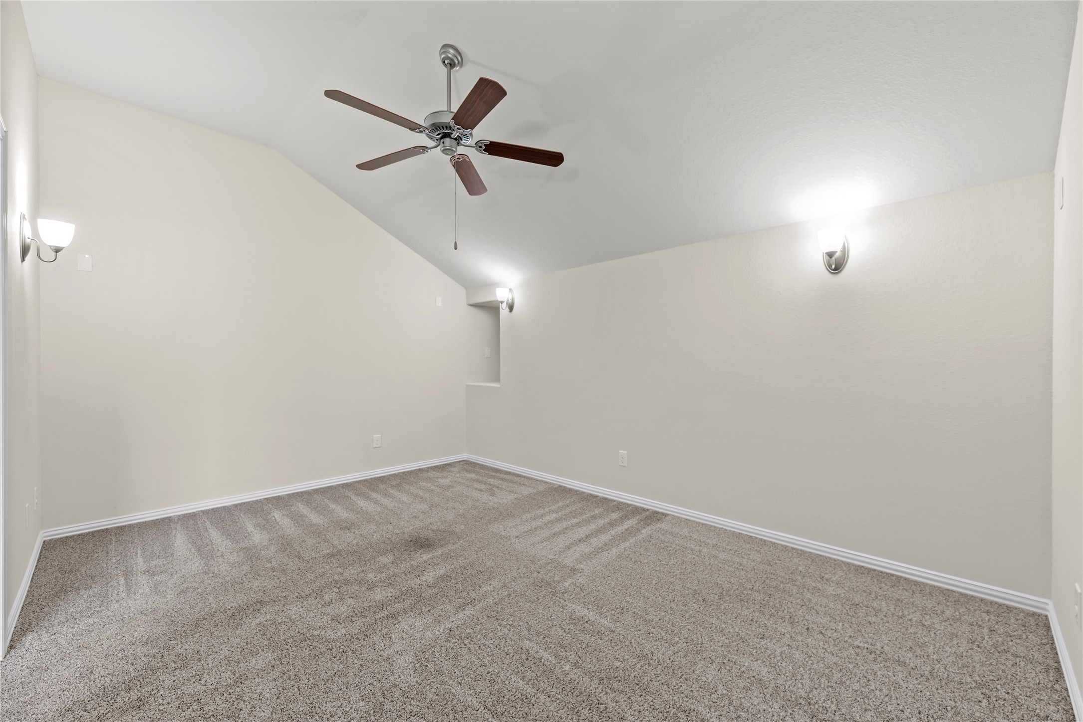 5205 Rainy Garden Court Rosharon, TX 77583 - Photo 28 of 43 a view of a room with a ceiling fan and window