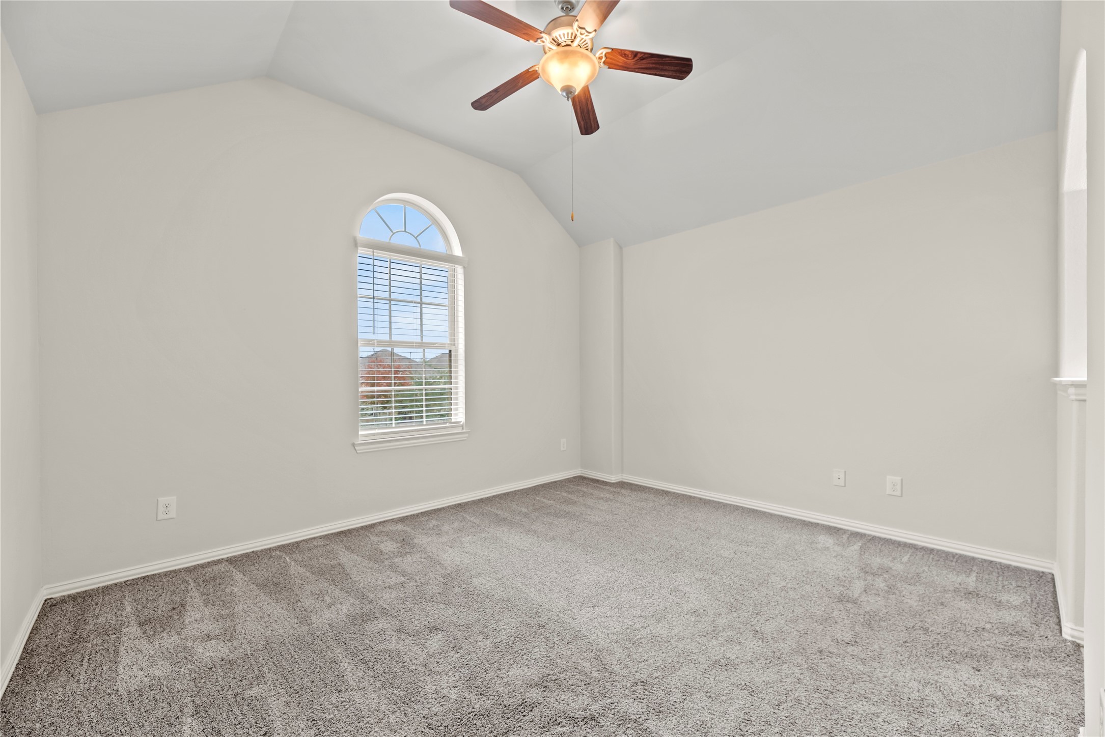 5205 Rainy Garden Court Rosharon, TX 77583 - Photo 32 of 43 an empty room with windows and fan